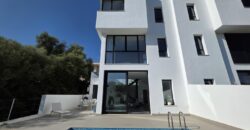 MODERNA CASA ADOSADA EN PORTOCOLOM 719.800 €