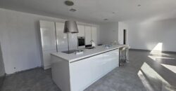 MODERNA CASA ADOSADA EN PORTOCOLOM 719.800 €