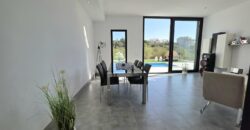 MODERNA CASA ADOSADA EN PORTOCOLOM 719.800 €