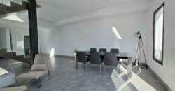 MODERNA CASA ADOSADA EN PORTOCOLOM 719.800 €