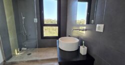 MODERNA CASA ADOSADA EN PORTOCOLOM 719.800 €