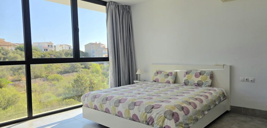 MODERNA CASA ADOSADA EN PORTOCOLOM 719.800 €