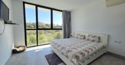 MODERNA CASA ADOSADA EN PORTOCOLOM 719.800 €