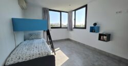 MODERNA CASA ADOSADA EN PORTOCOLOM 719.800 €