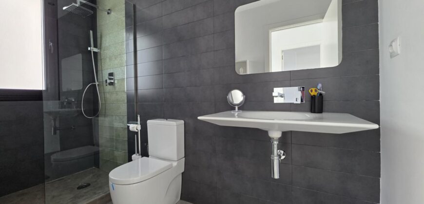 MODERNA CASA ADOSADA EN PORTOCOLOM 719.800 €