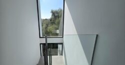 MODERNA CASA ADOSADA EN PORTOCOLOM 719.800 €