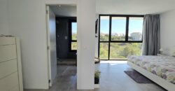 MODERNA CASA ADOSADA EN PORTOCOLOM 719.800 €