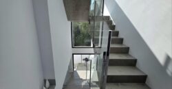 MODERNA CASA ADOSADA EN PORTOCOLOM 719.800 €