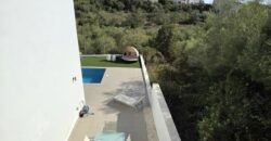 MODERNA CASA ADOSADA EN PORTOCOLOM 719.800 €