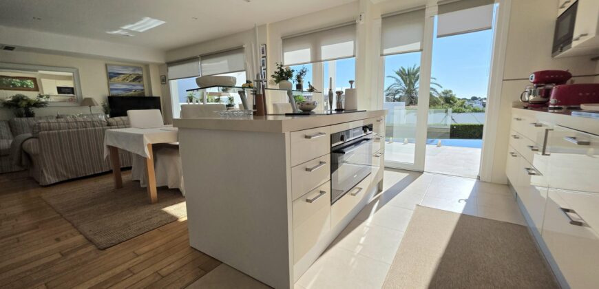 EXCLUSIVE SEMI-DETACHED HOUSE WITH FANTASTIC HARBOUR VIEWS IN CALA D’OR