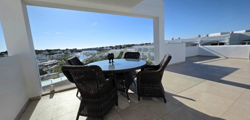 EXCLUSIVE SEMI-DETACHED HOUSE WITH FANTASTIC HARBOUR VIEWS IN CALA D’OR