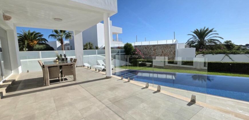 EXCLUSIVE SEMI-DETACHED HOUSE WITH FANTASTIC HARBOUR VIEWS IN CALA D’OR
