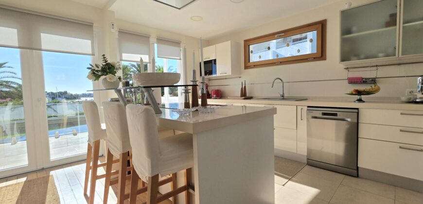 EXCLUSIVE SEMI-DETACHED HOUSE WITH FANTASTIC HARBOUR VIEWS IN CALA D’OR